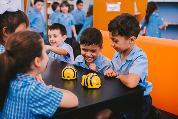 Students using bee bots in St Mary Star of the Sea Catholic Primary School Hurstville